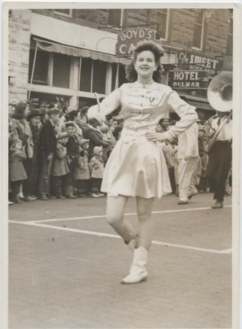 Downtown Streets of Fort Worth in late 50's. This is a postcard of Sissie Smith, a Paschal High Drum Major. Notice Boyd's Cafe Sign and Hotel Delmar in background. ( Personal Note, Sissie was my Aunt.)
